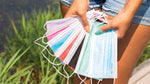 Load image into Gallery viewer, Girl fanning out multiple colored masks

